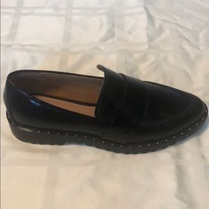 Black studded loafers